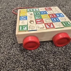 Wooden Alphabet Block Pull Toy with Red Wheels